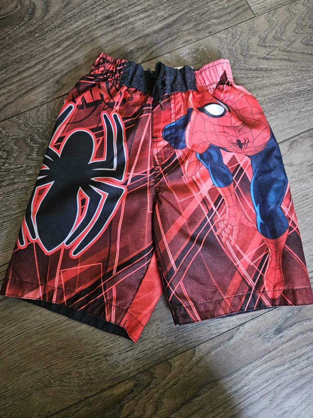 Pair Of Spider-Man Red Swim Trunks and Blue-Orange Floral Swim Shorts - Kids